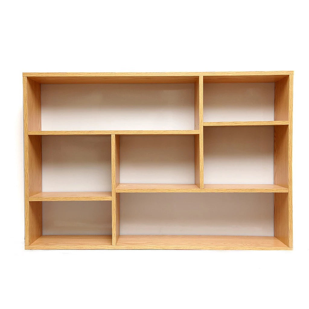 Wooden bookshelf with six compartments on a white background