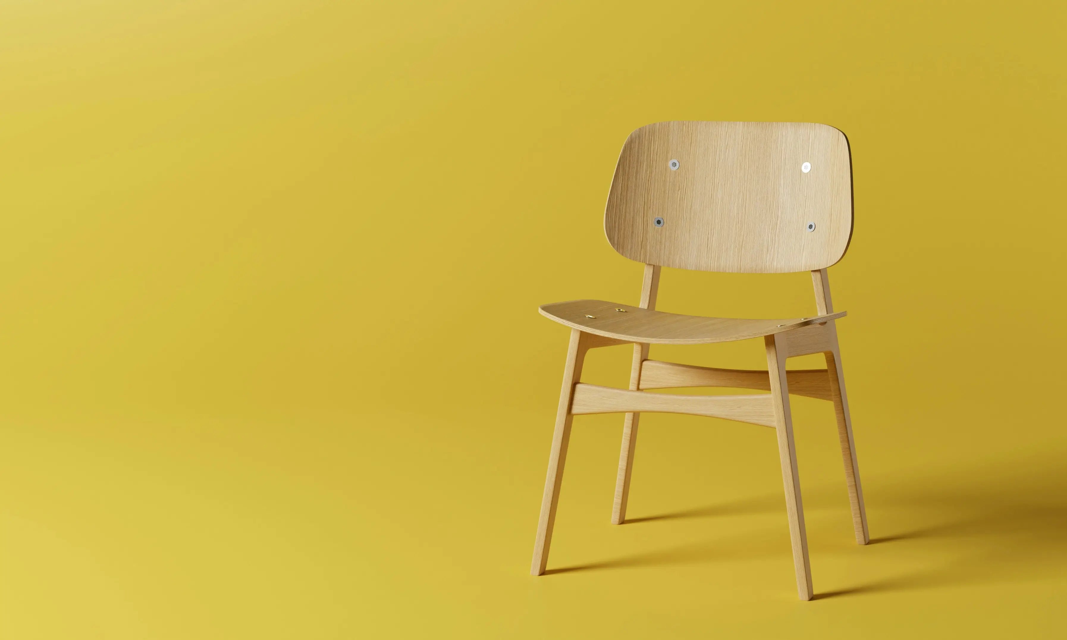 A wooden chair furniture in yellow background
