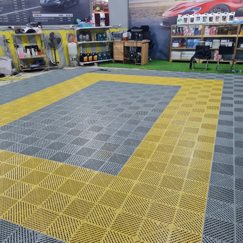 324 Pieces - Heavy-Duty Plastic Floor Covering Tile – Anti-Slip Interlocking Tile for Garage, Car Wash, and Workshop Flooring